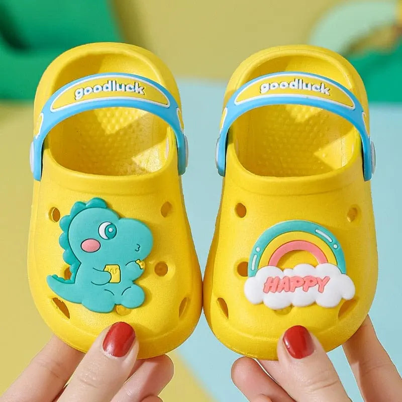 Kids cartoon hole sandals from Showlu Fashion Store, soft anti-skid EVA beach shoes for boys and girls on sandy terrain.
