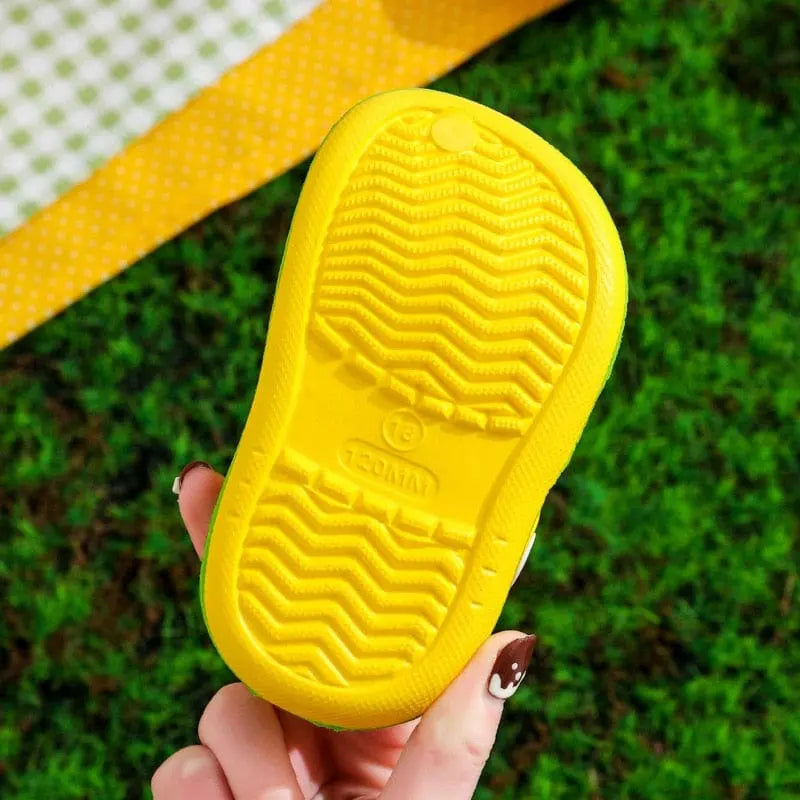 Kids cartoon hole sandals by Showlu Fashion Store, soft anti-skid EVA beach shoes for boys and girls, perfect for sandy beaches.