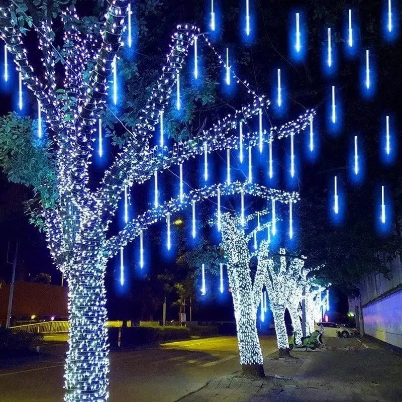 Showlu Fashion Store LED meteor shower rain lights, waterproof 30cm falling raindrop string lights for festive holiday and patio decor.