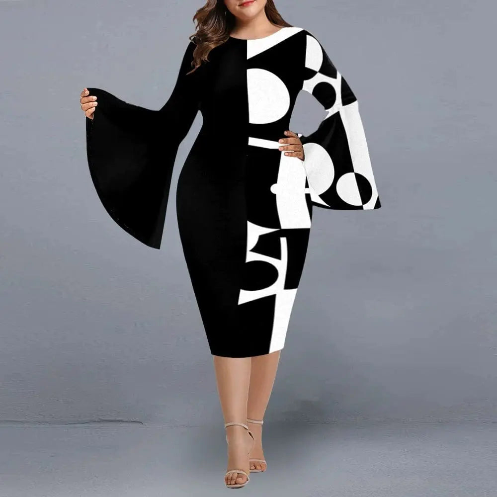 Plus size printed mesh wrap dress by Showlu Fashion with long sleeves and V-neck, featuring a gauzy fabric and stylish design.