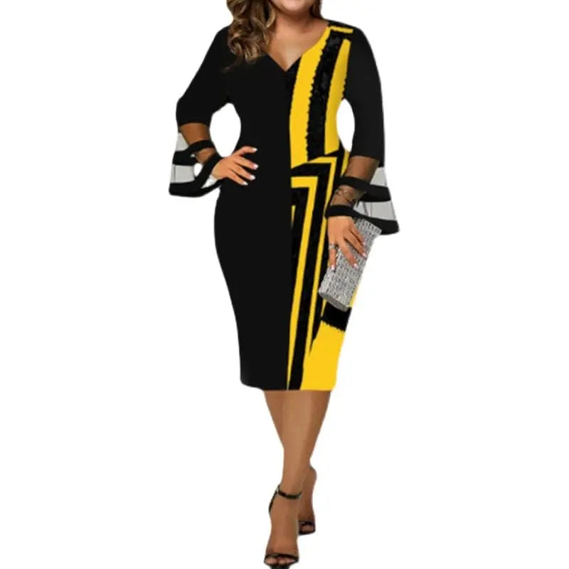 Plus size printed mesh wrap dress by Showlu Fashion with long sleeves and V-neck, featuring a gauzy fabric and stylish design.