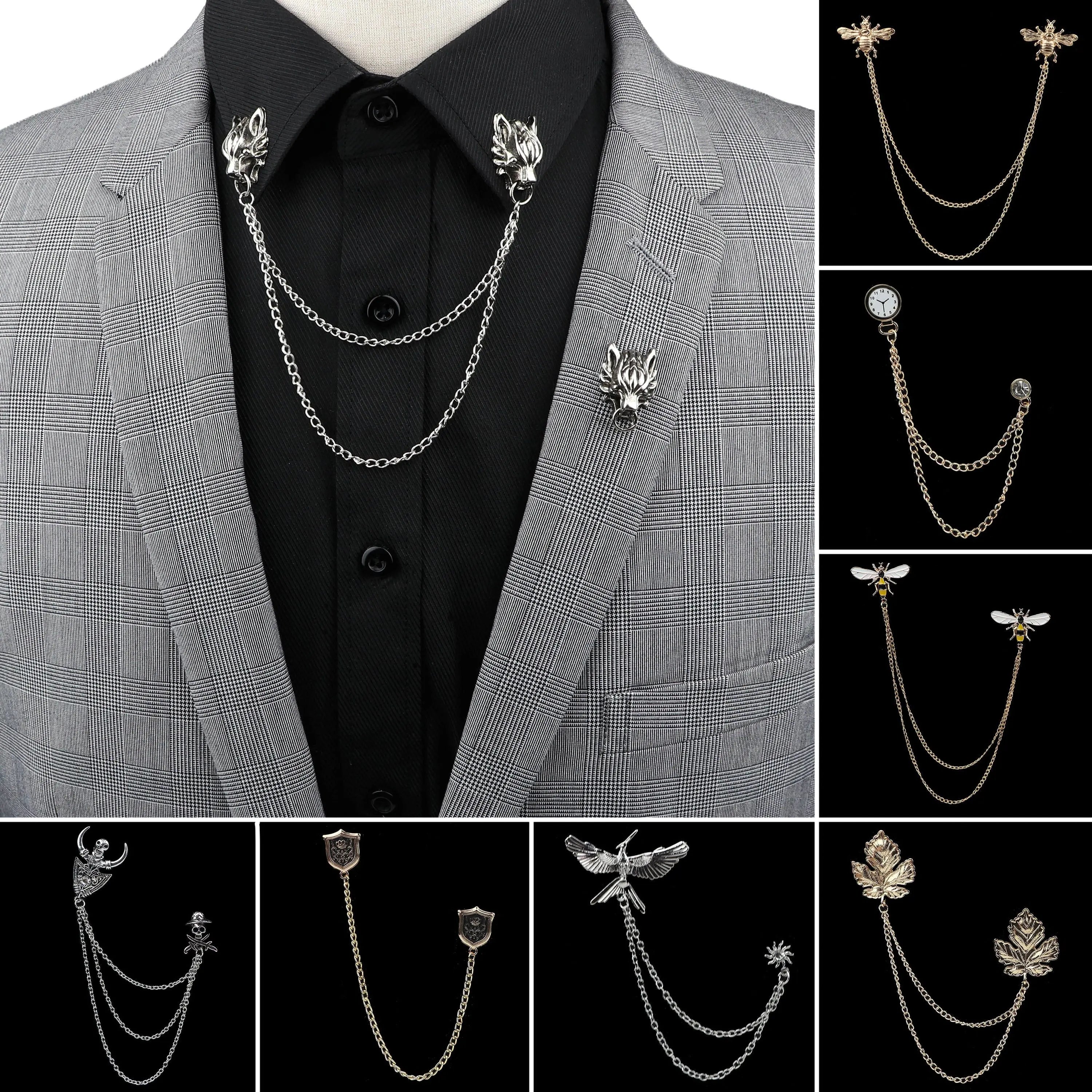 Anel Demosthene Dragon lapel pin with retro tassel chain on a suit jacket, featuring a detailed dragon badge for formal accessories.