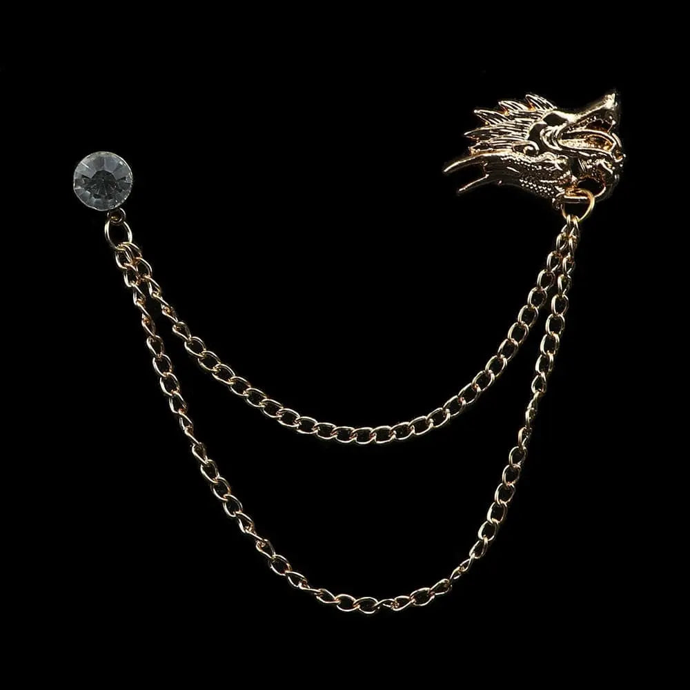 Anel Demosthene Dragon Lapel Pin with retro tassel chain on suit collar, stylish brooch for wedding or party attire.