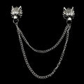 Anel Demosthene dragon lapel pin with retro tassel chain, worn on a suit lapel for wedding or party accessories.
