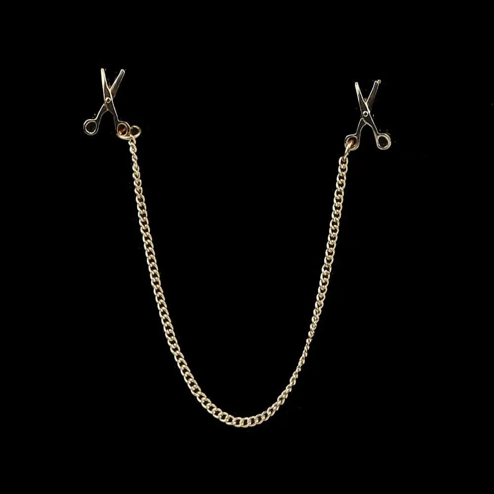 Anel Demosthene Dragon lapel pin on a suit collar, featuring a retro tassel chain brooch for wedding or party accessories.