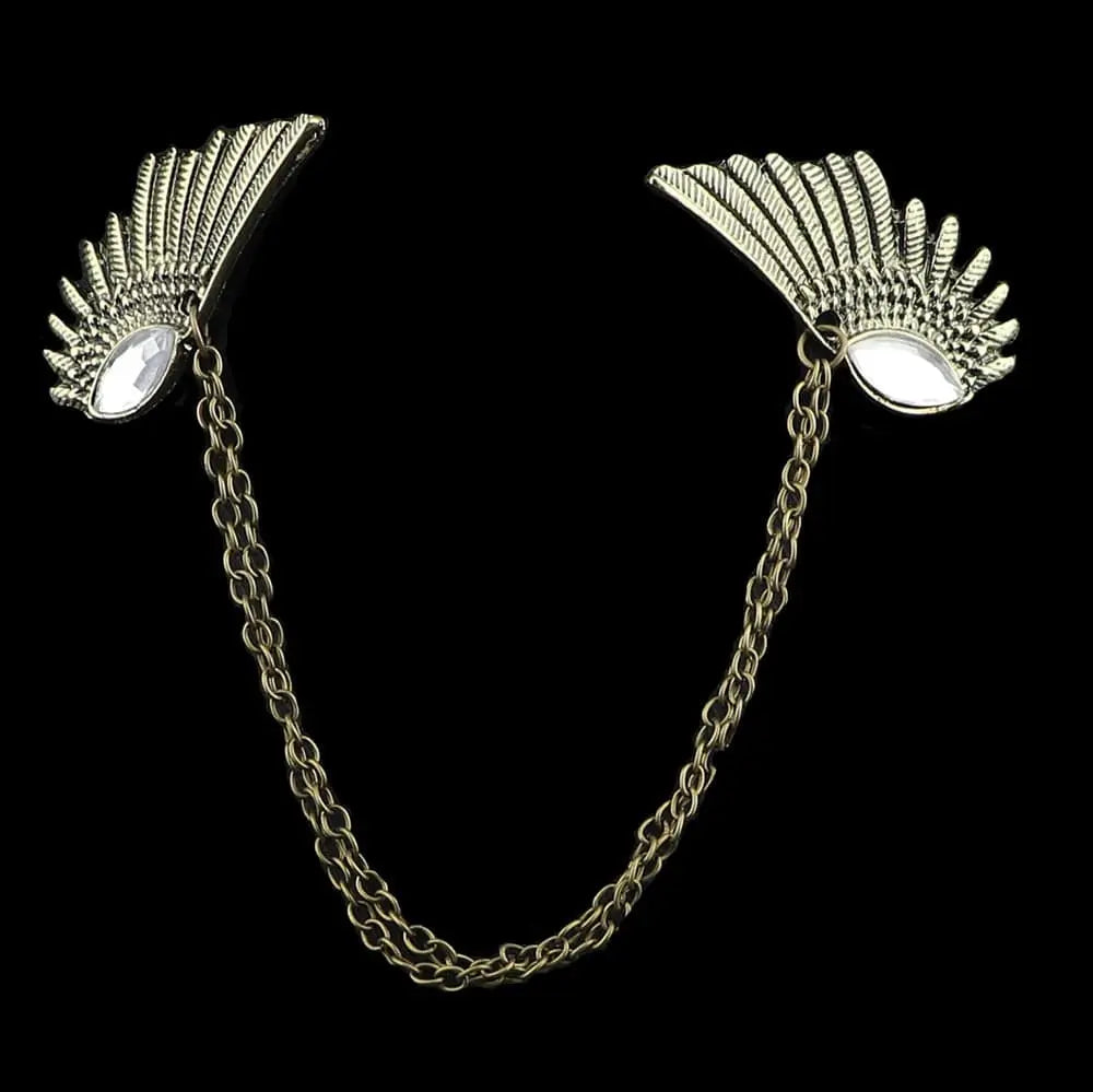 Anel Demosthene Dragon lapel pin with retro tassel chain on a man’s suit lapel, stylish brooch for dress or party accessories.