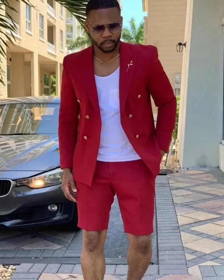 Men's red summer suit by Showlu Fashion Store featuring a double-breasted blazer and matching short pants for casual or formal wear.