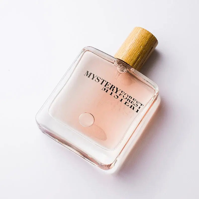 Mystery Forest Fresh Incense perfume bottle, long-lasting unisex fragrance with forest-inspired scent, shown in a sleek bottle design