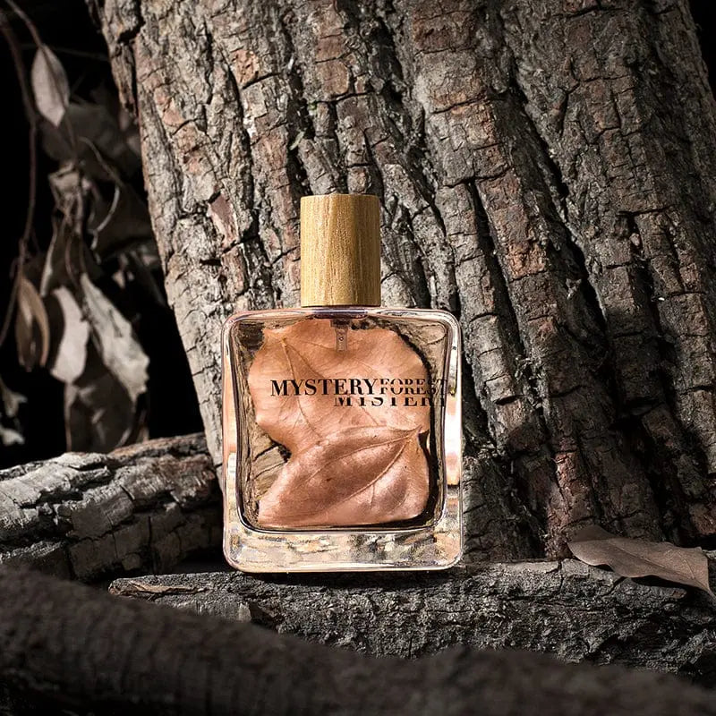 Mystery Forest Fresh Incense perfume bottle, long-lasting unisex fragrance with forest-inspired scent, shown from a side view.