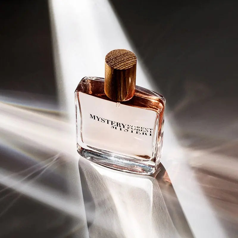 Mystery Forest Fresh Incense perfume bottle, long-lasting unisex fragrance with natural forest scent, shown in a sleek bottle.
