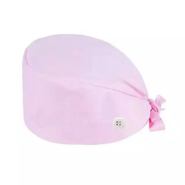 Unisex cotton scrub cap with adjustable fit and buttons, worn by healthcare professionals like nurses and doctors in hospital settings.
