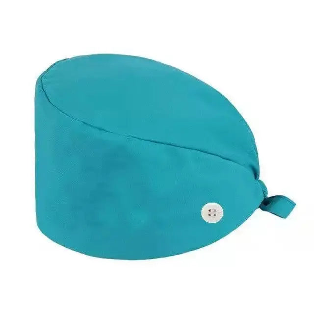 Showlu unisex cotton scrub cap with adjustable fit, button accents, suitable for nurses and doctors working in hospitals.
