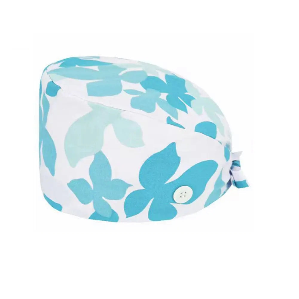 Unisex cotton scrub cap with adjustable fit, buttons, and hospital print, designed for nurses and doctors to wear during medical shifts.