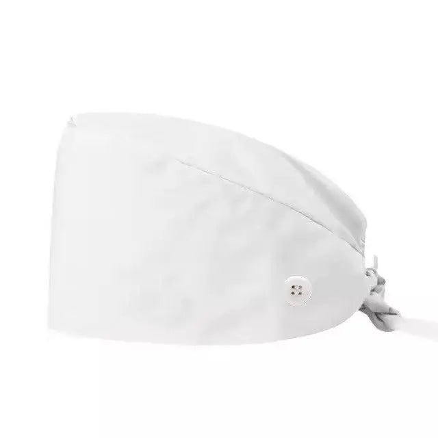 Unisex cotton scrub cap with adjustable fit and button details, suitable for nurses and doctors working in hospitals.