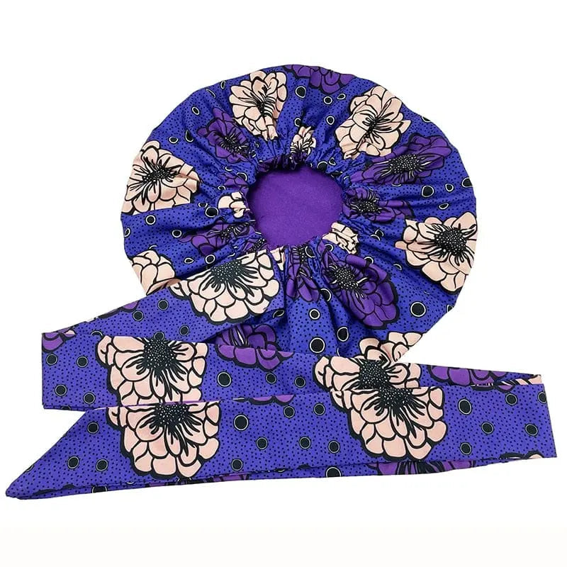 African Ankara satin-lined bonnet with long ribbon headwrap, featuring vibrant Ankara pattern and double-layer design for women.