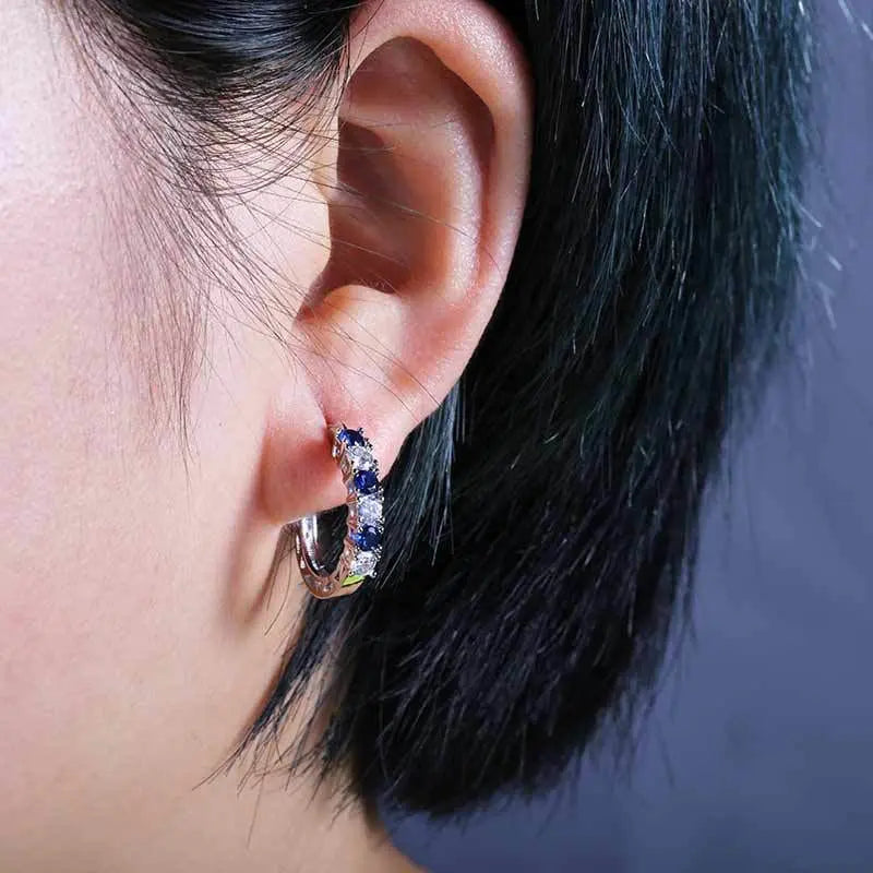 Showlu Fashion silver stud earrings featuring round CZ zircon stones, crafted in 925 sterling silver for women.