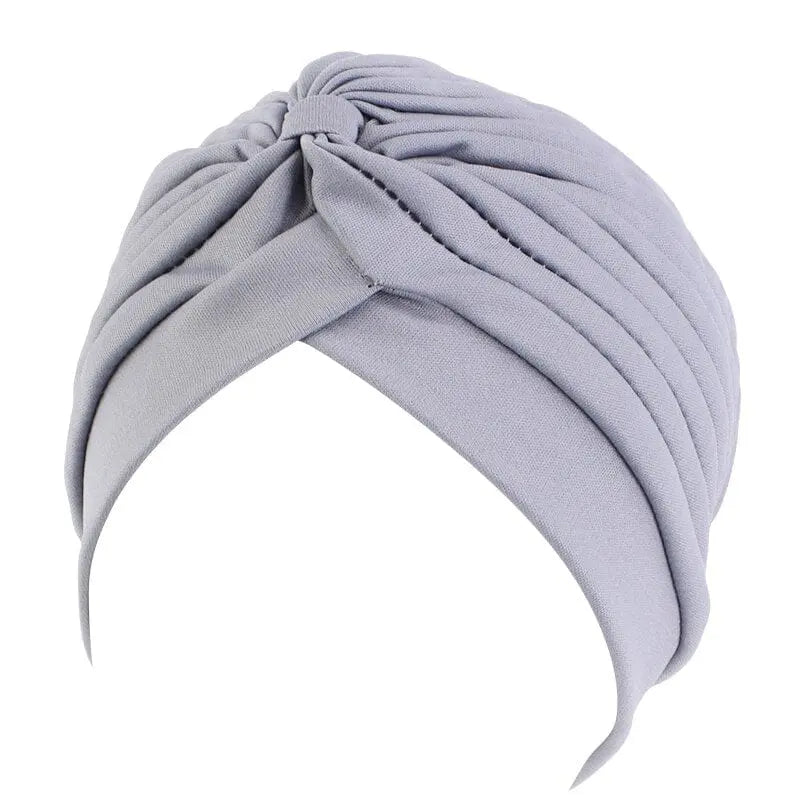 Showlu Fashion solid color flower decoration turban for women, stylish head wrap and hair accessory, versatile headwear for women.