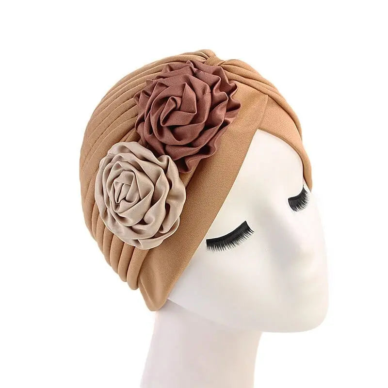 Solid color flower-decorated turban head wrap for women, stylish hairwear and headband from Showlu Fashion Store.