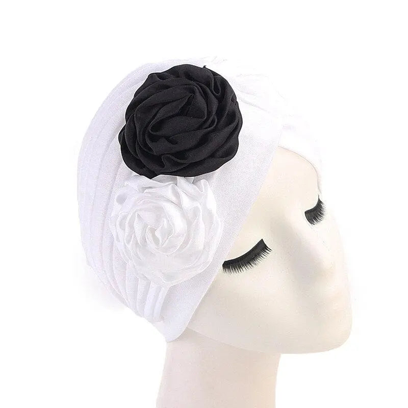 Solid color floral turban head wrap for women, stylish hair accessory and headwear, ideal for fashion and special occasions.