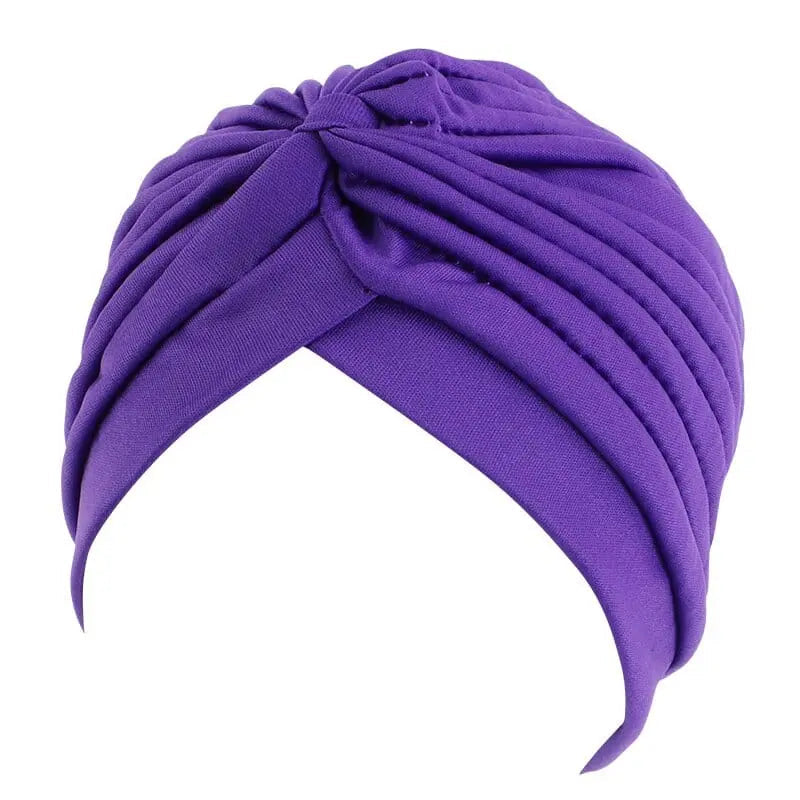 Solid color flower-embellished turban head wrap for women, stylish hair accessory and headwear by Showlu Fashion Store.