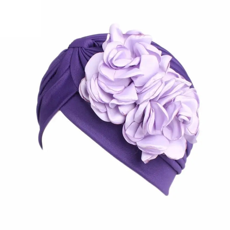 Solid color flower-decorated turban head wrap for women, stylish hair accessory and headwear by Showlu Fashion Store.