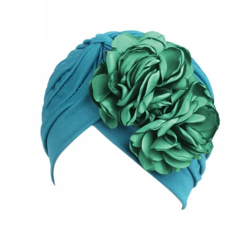 Solid color flower-decorated turban head wrap for women, stylish hair accessory and headwear by Showlu Fashion Store.