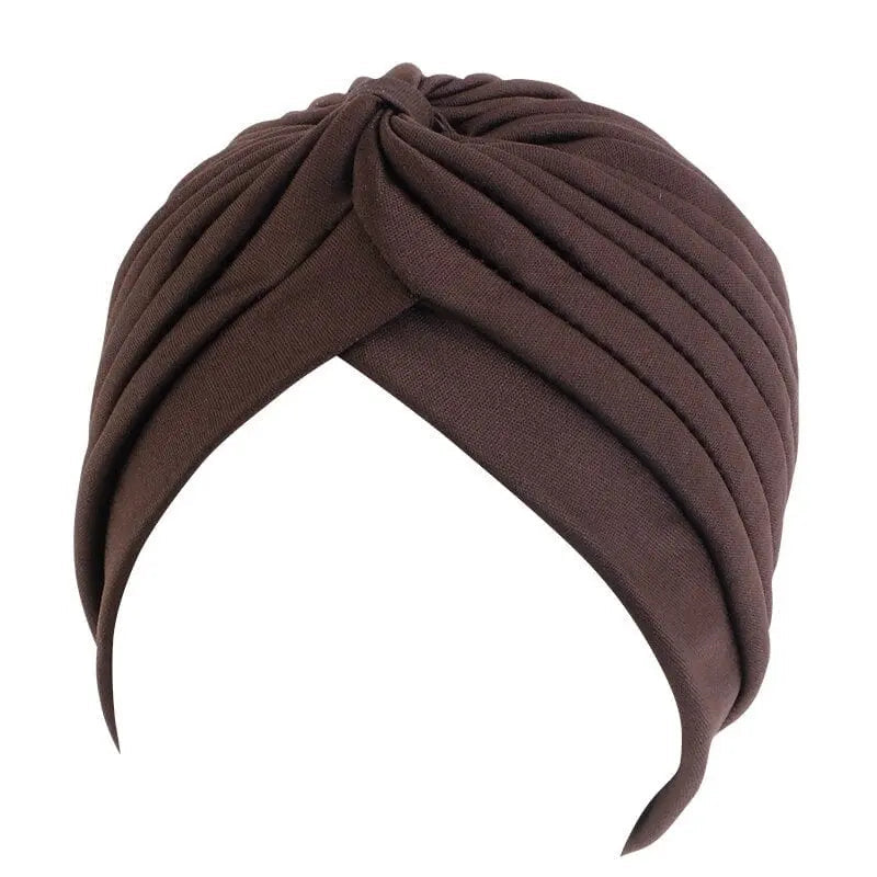 Solid color floral turban head wrap for women, stylish hair accessory and headwear, perfect for fashion or cancer head coverings.