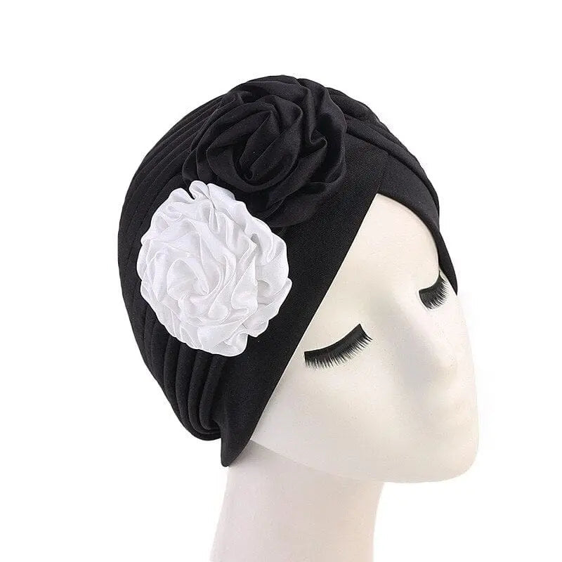 Solid color flower-decorated turban for women, Showlu Fashion Store head wrap, stylish hair accessory and headwear for ladies.