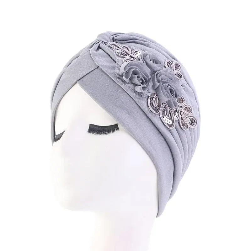 Solid color flower-decorated turban head wrap for women, stylish hair accessory and fashion headwear by Showlu Fashion Store.