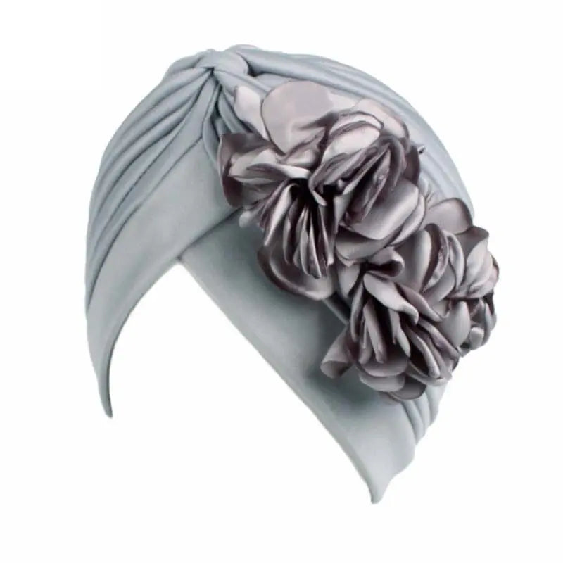 Solid color flower-decorated turban head wrap for women, stylish hair accessory and headwear by Showlu Fashion Store.