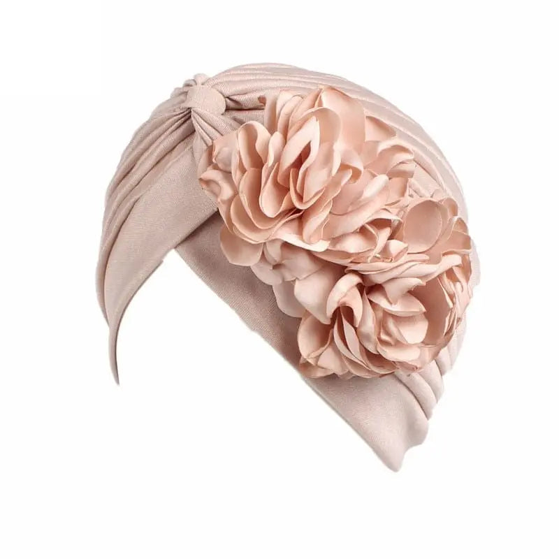 Solid color flower-decorated turban head wrap for women, stylish hair accessory and headwear from Showlu Fashion Store.