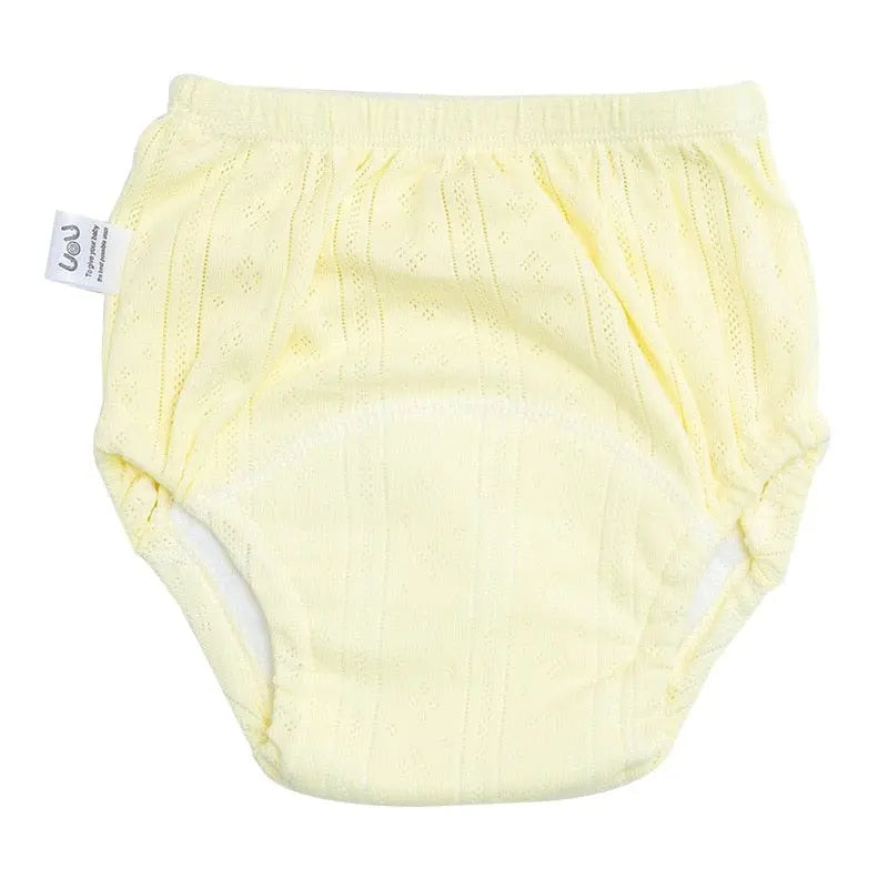 Reusable Showlu baby training pants in solid color, washable cotton cloth diapers for newborn boys and girls.