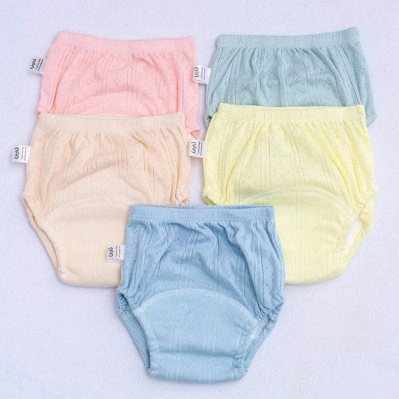 Showlu reusable baby training pants in solid color, washable cotton cloth diapers for newborns and infants, suitable for boys and girls.