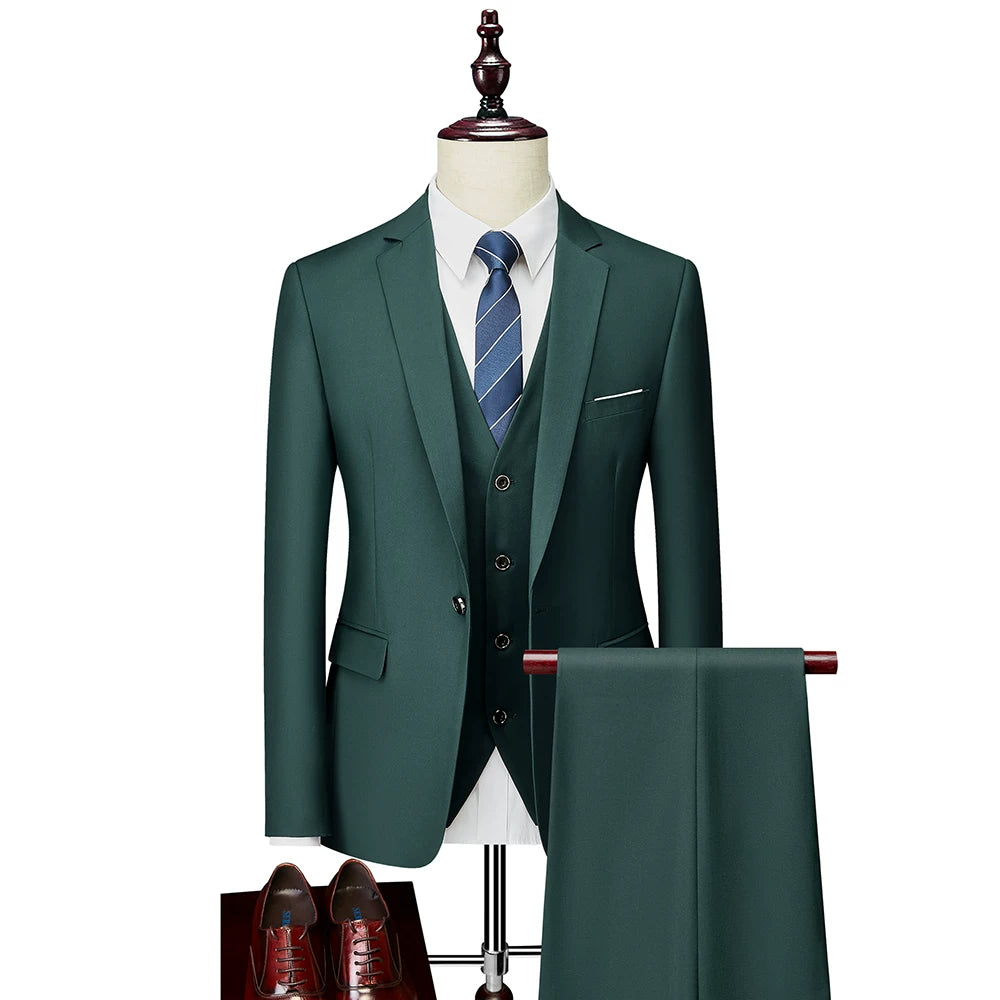 A dark green slim-fit three-piece suit with a white shirt and blue striped tie on a mannequin.