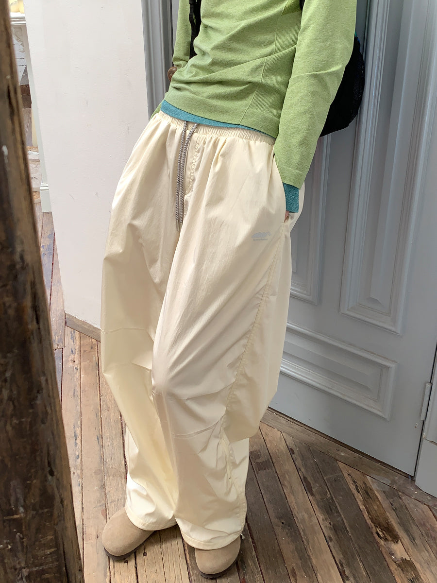 SHOWLU FASHION women's quick-drying loose side zipper leg pants displayed on model, showcasing comfortable and stylish activewear.