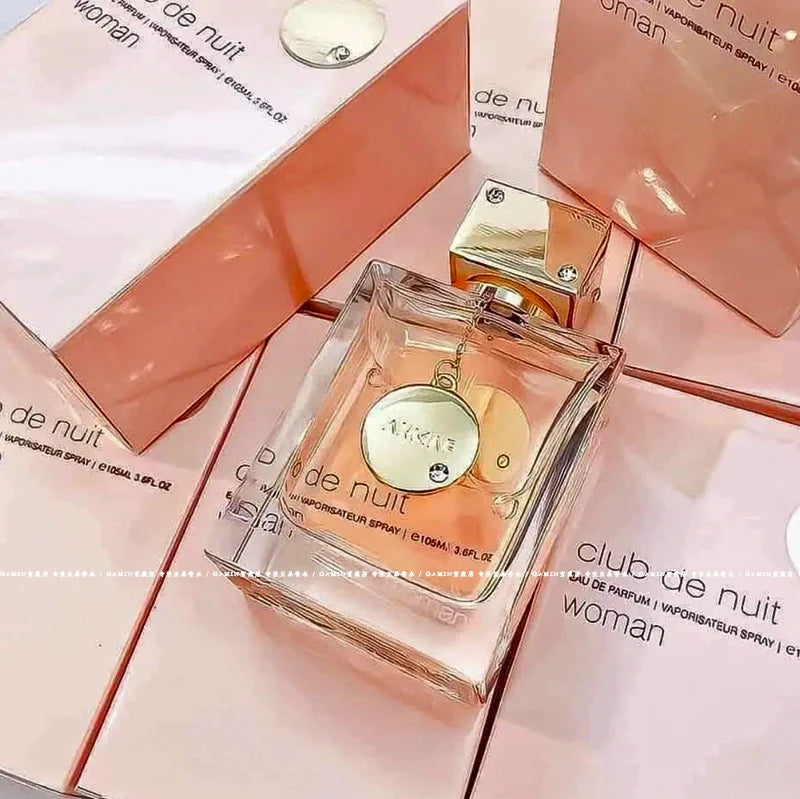 Fruity floral perfume sample for women featuring Armaf Club de Nuit Woman EDP, showcasing a delicate floral and fruity scent.