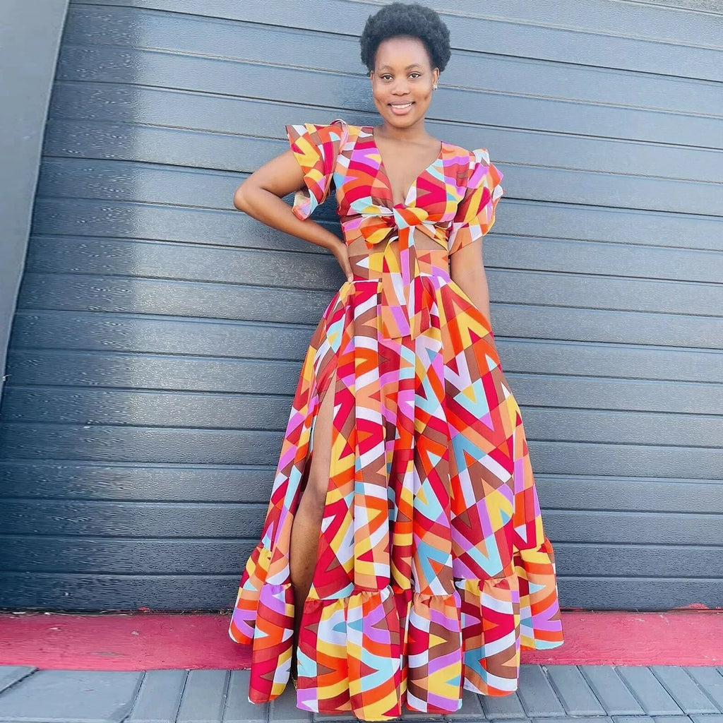 Plus size SHOWLU FASHION summer printed casual dress for women, featuring a sexy, stylish design and vibrant floral pattern.