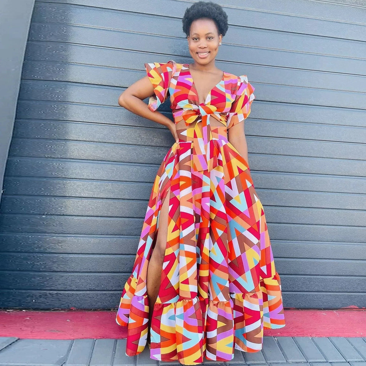 Plus size SHOWLU FASHION summer printed casual dress for women, featuring a sexy, stylish design and vibrant floral pattern.