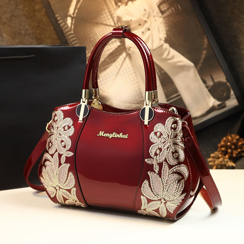 Ye Shidai women's genuine leather crossbody handbag with elegant design, featuring a spacious interior and adjustable strap.
