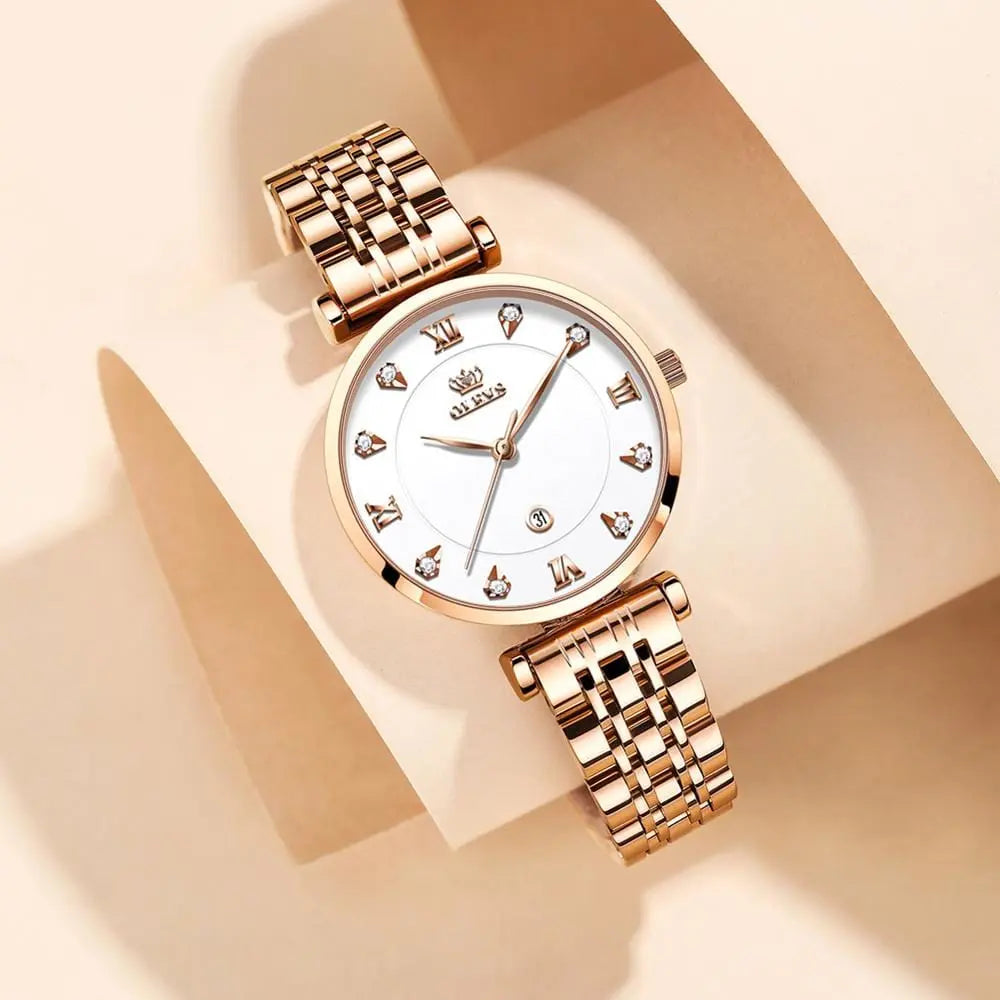 OLEVS women's luxury quartz watch with stainless steel strap, waterproof design, and date display, stylish for women.