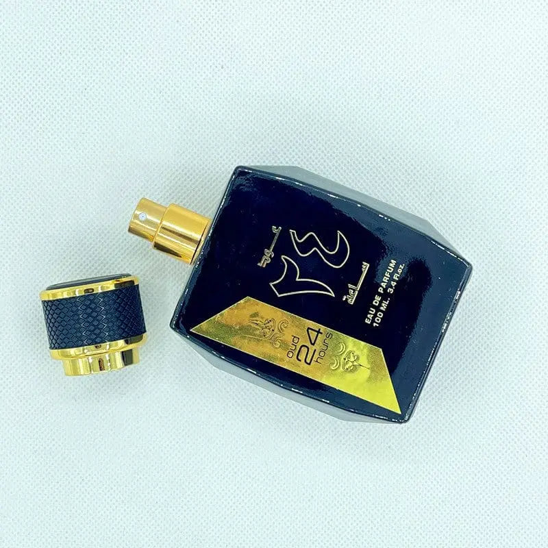 OUD 24 Hours Black Gold Arabian perfume bottle showcasing luxurious black and gold design, ideal for Middle Eastern fragrance enthusiasts