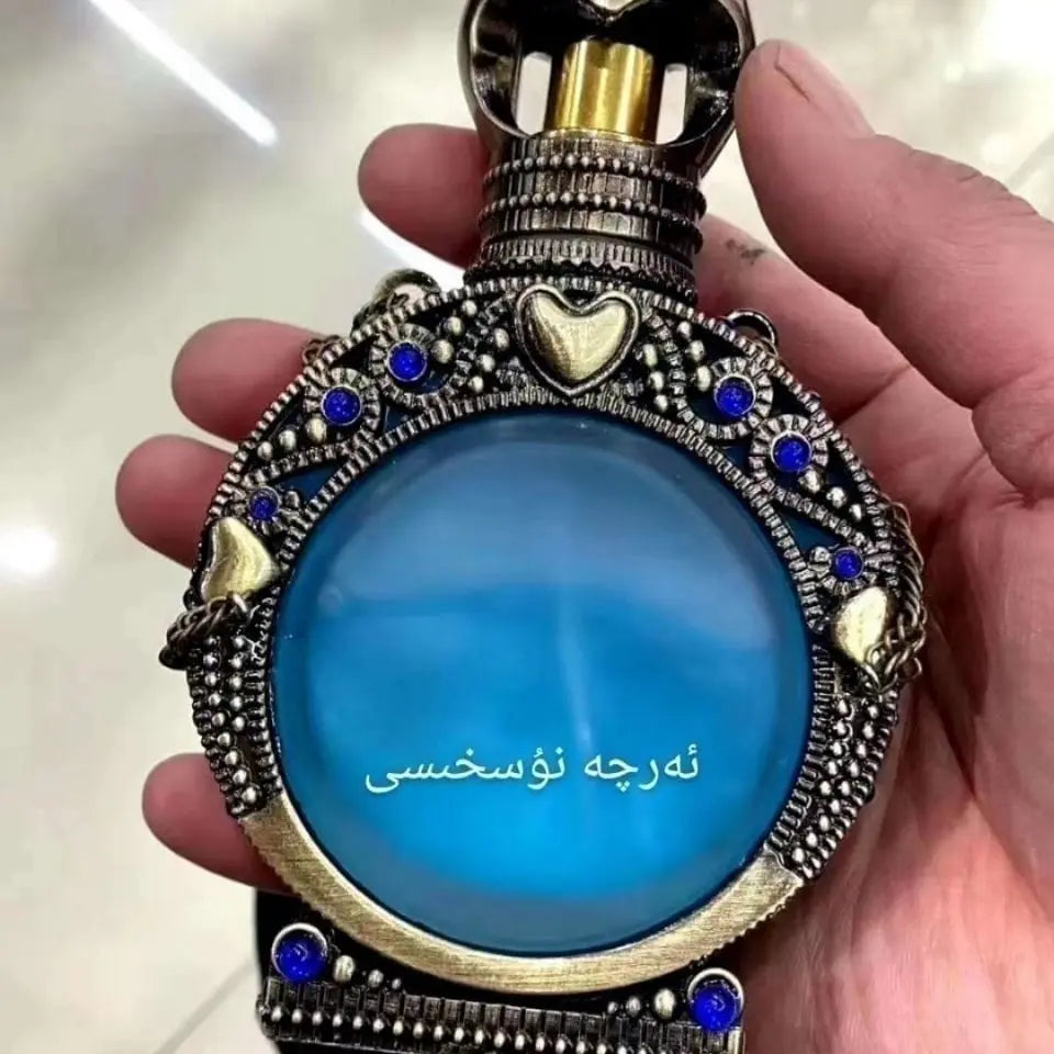 Showlu Fashion Oil Perfume in a 15ml bottle with a fresh, elegant scent and long-lasting fragrance.