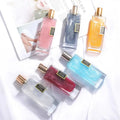 Showlu Gold Sand perfume bottle with gold accents, showcasing a long-lasting unisex fragrance for men and women.