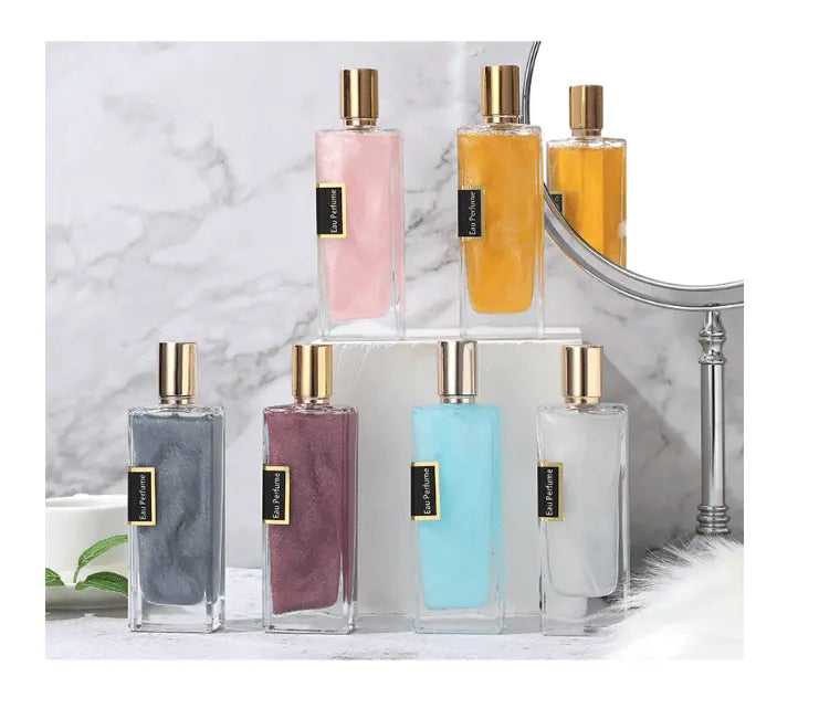 Showlu Gold Sand perfume bottle with gold accents, showcasing a long-lasting unisex fragrance for men and women, elegant design.