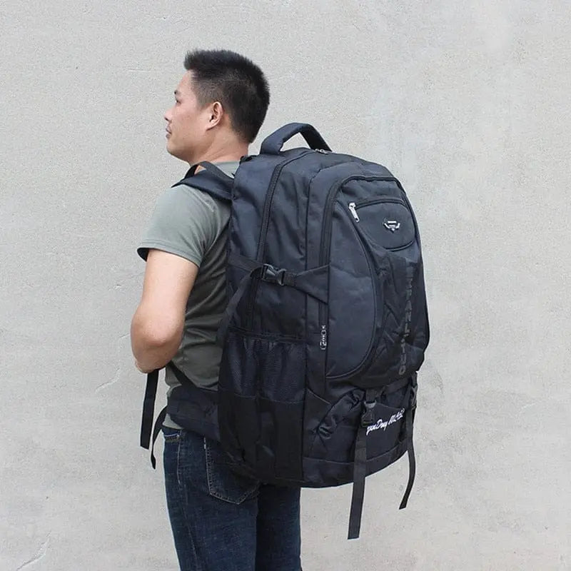 Large 70L waterproof hiking backpack by Showlu Fashion Store, with multiple compartments and durable wear-resistant design for trekking and travel.
