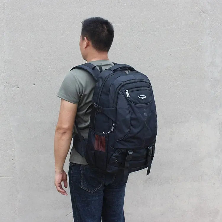 Large 70L waterproof hiking backpack by Showlu Fashion Store, sturdy travel and trekking bag for men and women.