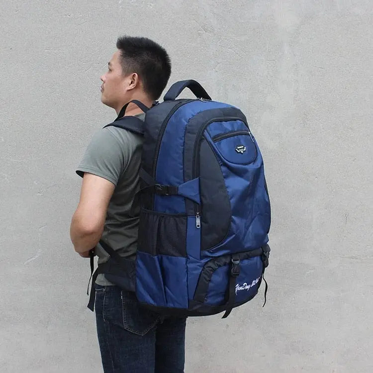 Large 70L waterproof hiking backpack by Showlu Fashion Store, with multiple compartments, durable material, suitable for trekking and camping.