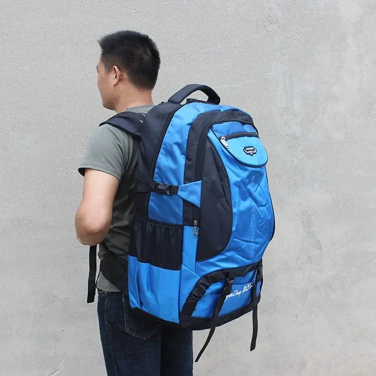 Large 70L waterproof hiking backpack from Showlu Fashion Store, rugged outdoor travel and trekking gear with multiple compartments.