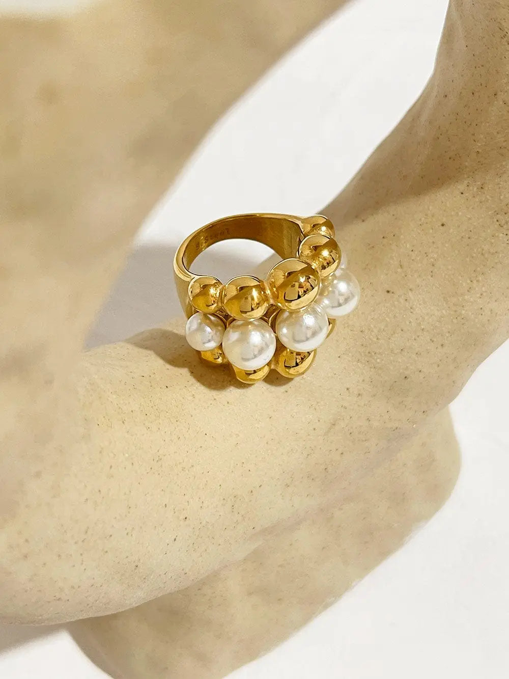 Gold plated stainless steel Peri'sBox statement ring with chunky faux pearls, large design, and bold jewelry style.