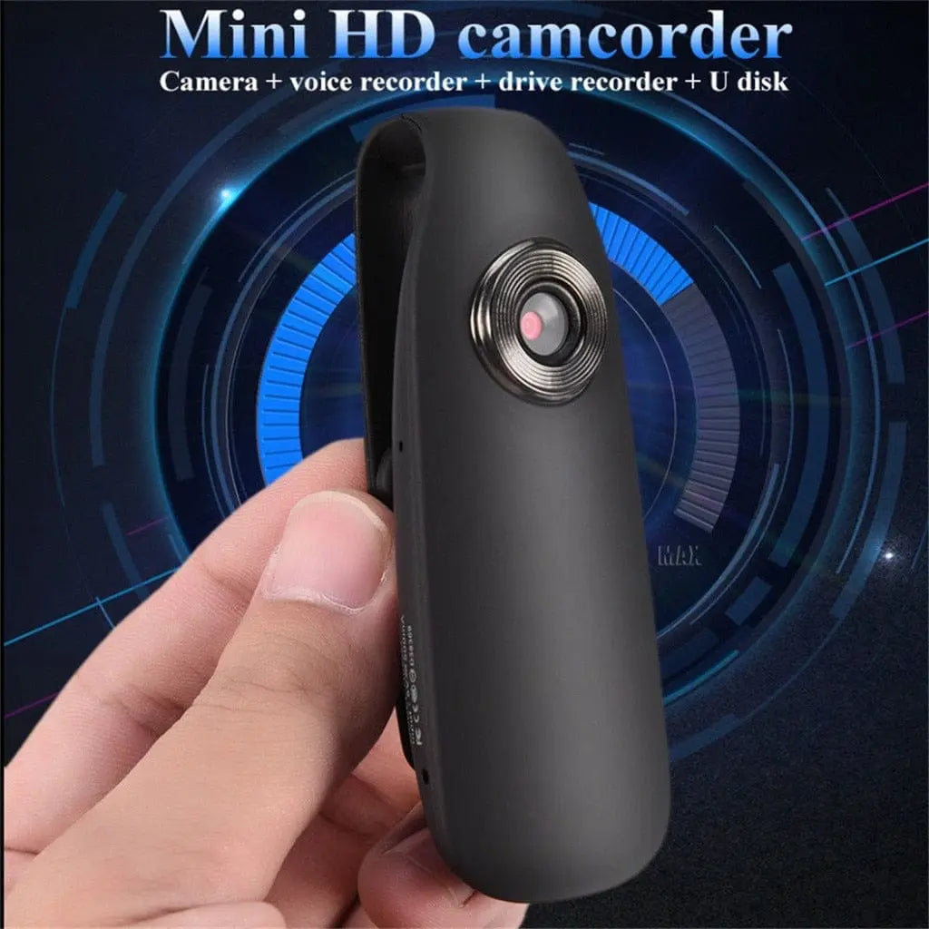 Maroon Hera mini camera with maroon body, handheld design, 1080p HD video, night vision, portable DVR for tech accessories.